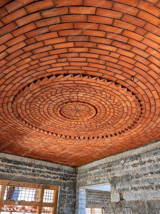 Brick domed ceiling, concentric radiating courses around a rosette